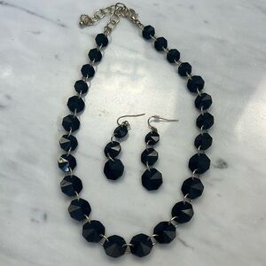 Black and gold necklace and earrings set.